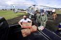 Ação conjunta da Portos do Paraná, Defesa Civil e batalhão aéreo da Polícia Militar entregou cestas básicas em comunidades extremamente isoladas.