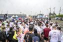 Na manhã deste domingo (16), apesar da chuva, a movimentação foi intensa não de carga, mas de pessoas, no cais do Porto de Paranaguá. Uma prova inédita, a primeira Corrida do Porto reuniu mais de mil atletas, em quatro diferentes modalidades.