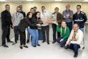 Colaboradores da Portos do Paraná comemoram pentacampeonato com troféu itinerante