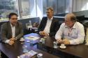 Durante reunião na sede da APPA, o Ministro dos Portos Leônidas Cristino, o superintendente dos Portos do Paraná, Airton Vidal Maron e o diretor empresarial Lourenço Fregonese