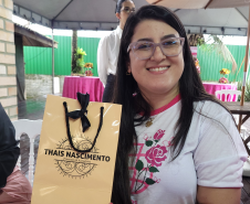 Mulheres prestigiam Feijoada Rosa da Portos do Paraná