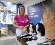 Portuários do Paraná doam cabelos para campanha Outubro Rosa