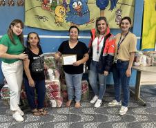 Cestas básicas arrecadadas na Corrida do Porto são distribuídas em Paranaguá