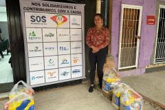 Comunidade portuária paranaense entrega cestas básicas para famílias atingidas por enchentes no RS