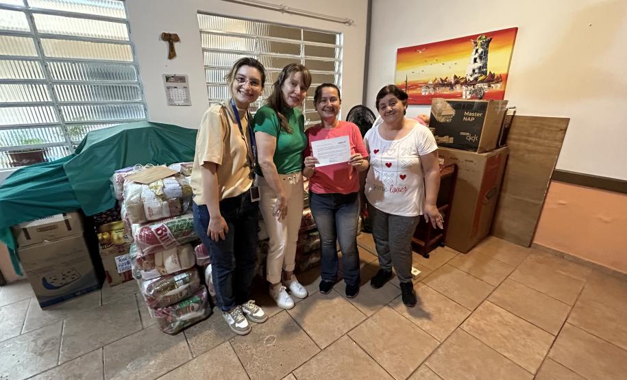 Cestas básicas arrecadadas na Corrida do Porto são distribuídas em Paranaguá